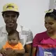 Victor with his parents, Dina Lopez and Victor Mendoza. Image by Mariana Rivas. Colombia, 2019.