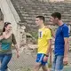 Oleksandr Popruzhenko (yellow) runs with teammate Oleksandr Radioniuk (blue) in the qualifying race for the marathon. Image by Oksana Parafeniuk, courtesy of Roads & Kingdoms. Ukraine, 2018.