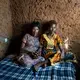 Clare and Elizabeth. Image by Jonathan Torgovnik. Rwanda, 2018.