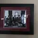 A photo from Xi Jinping's visit to the Iowa State Capitol in 1985 hangs inside the entry of U.S. Ambassador to China Terry Branstad's residence Sunday, September 24, 2017, in Beijing, China. Xi is now the president of China. Image by Kelsey Kremer. China, 2017.