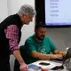 Don Belt advises a faculty member of the diversity department as he creates his San Diego State University Walk on Campus photo slideshow using StoryMap. Image by Lauren Shepherd. United States, 2017.