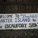 Another sign in Kaktovik. Image by Nick Mott. United States, 2019.