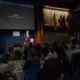 Executive Director Jon Sawyer speaks about the Pulitzer Center's relationship with the Luce Foundation and welcomes Michael Gilligan to the stage. Image by Jin Ding. United States, 2019.