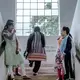 A moment with friends inside the girls' hostel where Purnima lives. Image by Arko Datto. India, 2018.