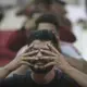 In this Thursday, Oct. 31, 2019, photo, recovering drug users perform yoga at a de-addiction center in Kapurthala, in the northern Indian state of Punjab. India has twice the global average of illicit opiate consumption. Researchers estimate 4 million Indians use heroin or other opioids, and a quarter of them live in the Punjab, India’s agricultural heartland bordering Pakistan, where some of the most vulnerable are driven to drugs out of desperation. Image by Channi Anand / AP Photo. India, 2019.